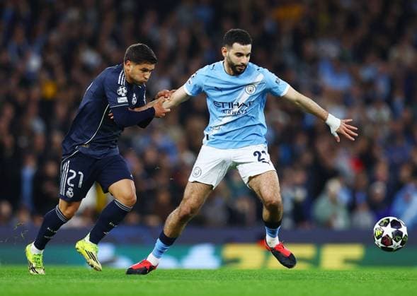 Brahim Diaz of Real Madrid and Rayan Ait-Nouri of Manchester City Manchester City v Real Madrid, UEFA Champions League, Round of 16, Second Leg, Football, Etihad Stadium, Manchester, UK - 17 Mar 2026Manchester Etihad Stadium United Kingdom EDITORIAL USE ONLY No use with unauthorised audio, video, data, fixture lists, club league logos or live services. Online in-match use limited to 120 images, no video emulation. No use in betting, games or single club league player publications.  Copyright: xMattxWest Shutterstockx 16776379s