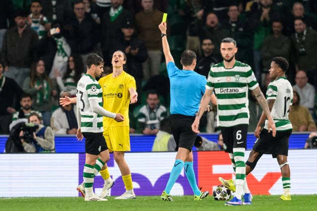 260317 Ulrik Saltnes of Bodo Glimt is shown a yellow card by Sandro Schärer, referee during the UEFA Champions League football match between Sporting CP and Bodo Glimt on March 17, 2026 in Lisbon Photo Marius Simensen BILDBYRAN COP 238 MM0063 bbeng football fotball fotboll soccer uefa champions league mesterligaen bodo glimt sporting clube de portugal sporting lisboa sporting lisbon sporting cp  Copyright: MARIUSxSIMENSEN BB260317ZI001