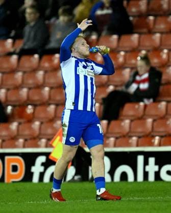 Joe Taylor of Wigan Athletic celebrates after scoring the team s first goal Barnsley v Wigan Athletic, Sky Bet League One, Football, Oakwell, Barnsley, UK - 17 Mar 2026Barnsley Oakwell United Kingdom EDITORIAL USE ONLY No use with unauthorised audio, video, data, fixture lists, club league logos or live services. Online in-match use limited to 120 images, no video emulation. No use in betting, games or single club league player publications. Copyright: xAnnaxGowthorpe Shutterstockx 16776372s