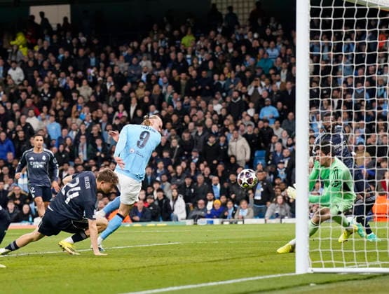 Manchester, England, 17th March 2026. Erling Haaland of Manchester City has a goal bound effort saved by Thibaut Courtois of Real Madrid during the Manchester City vs Real Madrid UEFA Champions League round of 16 match at the Etihad Stadium, Manchester. Picture credit should read: Andrew Yates Sportimage EDITORIAL USE ONLY. No use with unauthorised audio, video, data, fixture lists, club league logos or live services. Online in-match use limited to 120 images, no video emulation. No use in betting, games or single club league player publications. SPI_028_AY_ManCity_Madrid SPI-4612-0059