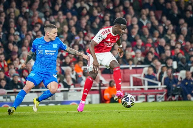 England Football UEFA Champions League 2025 2026, Round of 16 second leg FC Arsenal London vs Bayer 04 Leverkusen Emirates Stadium London Bukayo Saka Arsenal, 7 Ãlex Grimaldo Alex Grimaldo Bayer 04 Leverkusen, 20 Copyright: xJOERANxSTEINSIEKx