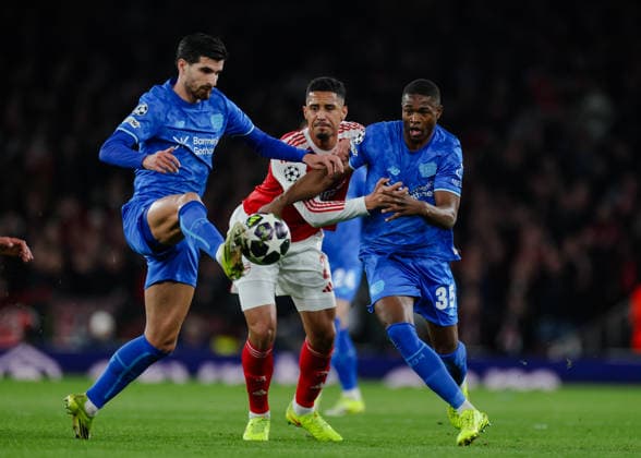 Champions League 2025 26 Last 16 Arsenal v Bayer Leverkusen Emirates Stadium 17.03.2026 William Saliba of Arsenal and Christian Kofane of Bayer Leverkusen Champions League 2025 26 Last 16 Arsenal v Bayer Leverkusen Emirates Stadium 17.03.2026 Photograph By Marc Aspland The Times  Copyright: xMarcxAsplandx NINTCHDBPICT001067502190