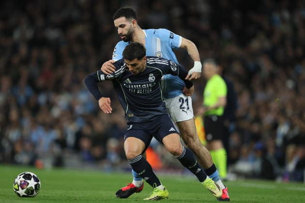 Manchester City FC v Real Madrid CF - UEFA Champions League 2025 26 Round of 16 Second Leg Brahim Diaz of Real Madrid CF and Ryan Ait-Nouri of Manchester City challenge during the UEFA Champions League 2025 26 Round of 16 Second Leg match between Manchester City FC and Real Madrid CF at City of Manchester Stadium on March 17, 2026 in Manchester, England. WARNING! This Photograph May Only Be Used For Newspaper And Or Magazine Editorial Purposes. May Not Be Used For Publications Involving 1 player, 1 Club Or 1 Competition Without Written Authorisation From Football DataCo Ltd. For Any Queries, Please Contact Football DataCo Ltd on +44 (0) 207 864 9121 Manchester City of Manchester Stadium England United Kingdom Copyright: xAllstarxPicturexLibraryxLtdx