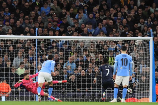 17th March 2026; Etihad Stadium, Manchester, England; UEFA Champions League Football, Manchester City versus Real Madrid; Vinicius Junior of Real Madrid scores from the penalty spot for 0-1 after 22 minutes  DavidxBlunsden Content restricted for UK based newspaper
