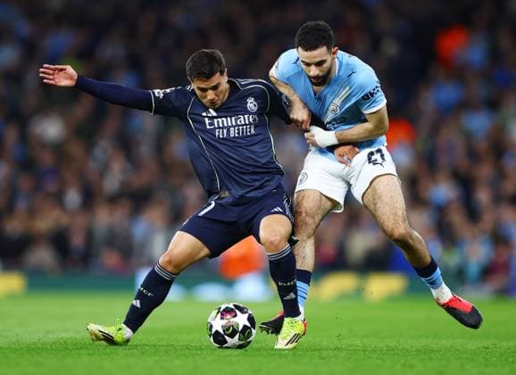 Rayan Ait-Nouri of Manchester City and Brahim Diaz of Real Madrid Manchester City v Real Madrid, UEFA Champions League, Round of 16, Second Leg, Football, Etihad Stadium, Manchester, UK - 17 Mar 2026Manchester Etihad Stadium United Kingdom EDITORIAL USE ONLY No use with unauthorised audio, video, data, fixture lists, club league logos or live services. Online in-match use limited to 120 images, no video emulation. No use in betting, games or single club league player publications.  Copyright: xMattxWest Shutterstockx 16776379af