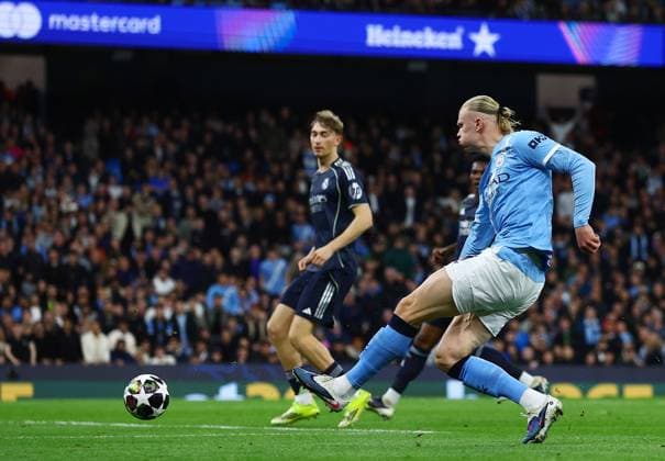 Erling Haaland of Manchester City takes a shot Manchester City v Real Madrid, UEFA Champions League, Round of 16, Second Leg, Football, Etihad Stadium, Manchester, UK - 17 Mar 2026Manchester Etihad Stadium United Kingdom EDITORIAL USE ONLY No use with unauthorised audio, video, data, fixture lists, club league logos or live services. Online in-match use limited to 120 images, no video emulation. No use in betting, games or single club league player publications.  Copyright: xMattxWest Shutterstockx 16776379ag