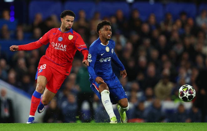 London, England, 17th March 2026. Warren Zaire-Emery of Paris Saint-Germain and Andrey Santos of Chelsea challenge for the ball during the Chelsea vs Paris Saint Germain UEFA Champions League round of 16 match at Stamford Bridge, London. Picture credit should read: Paul Terry Sportimage EDITORIAL USE ONLY. No use with unauthorised audio, video, data, fixture lists, club league logos or live services. Online in-match use limited to 120 images, no video emulation. No use in betting, games or single club league player publications. SPI_046_PT_Chelsea_PSG SPI-4610-0045