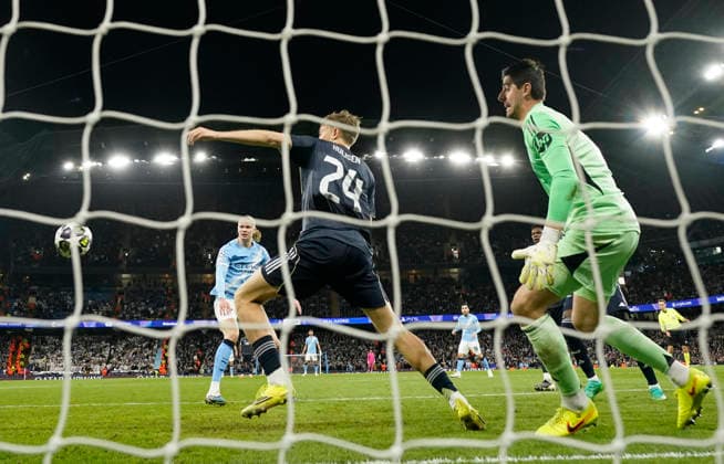 Manchester, England, 17th March 2026. Erling Haaland of Manchester City equalises on the night (1-1) during the Manchester City vs Real Madrid UEFA Champions League round of 16 match at the Etihad Stadium, Manchester. Picture credit should read: Andrew Yates Sportimage EDITORIAL USE ONLY. No use with unauthorised audio, video, data, fixture lists, club league logos or live services. Online in-match use limited to 120 images, no video emulation. No use in betting, games or single club league player publications. SPI_043_AY_ManCity_Madrid SPI-4612-0080