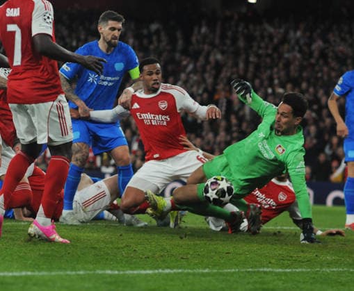 Football - 2025 2026 UEFA Champions League - Last Sixteen, Second Leg - Arsenal vs. Bayer Leverkusen - The Emirates Stadium - Tuesday 17th March 2026 Janis Blaswich of Bayer saves fro Gabriel of Arsenal COLORSPORT ANDREW COWIE 