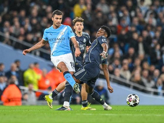 Manchester City v Real Madrid UEFA Champions League Rodri of Manchester City and Vinicius Junior of Real Madrid during the UEFA Champions League Round of 16 Second Leg match at the Etihad Stadium, Manchester 17 03 2026 UK Newspapers OUT Copyright: xKarlxVallantinex FIL-23148-0031