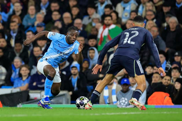Manchester City v Real Madrid, Champions League Jeremy Doku (11) of Manchester City tries to get past Trent Alexander-Arnold (12) of Real Madrid during the Champions League match between Manchester City and Real Madrid at the Etihad Stadium, Manchester, UK on 17 March 2026. Manchester Etihad Stadium Manchester UK Editorial use only , Copyright: xConorxMolloyx PSI-23911-0049