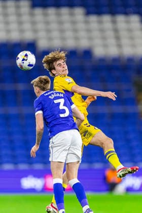 Cardiff City v Wycombe Wanderers, EFL Sky Bet League 1 Wycombe Wanderers forward Nathan Lowe (11) competes for a high ball with Cardiff City defender Joel Bagan (3) during the EFL Sky Bet League 1 match between Cardiff City and Wycombe Wanderers at the Cardiff City Stadium, Cardiff, UK on 17 March 2026. Cardiff Cardiff City Stadium South Glamorgan UK Editorial use only DataCo restrictions apply See www.football-dataco.com , Copyright: xDanxMintox PSI-23913-0020