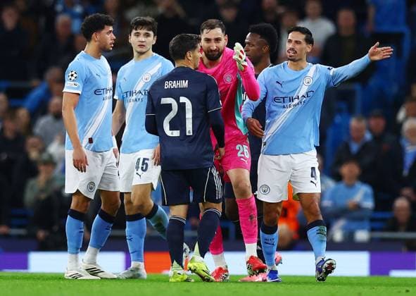 Manchester City goalkeeper Gianluigi Donnarumma and Brahim Diaz of Real Madrid Manchester City v Real Madrid, UEFA Champions League, Round of 16, Second Leg, Football, Etihad Stadium, Manchester, UK - 17 Mar 2026Manchester Etihad Stadium United Kingdom EDITORIAL USE ONLY No use with unauthorised audio, video, data, fixture lists, club league logos or live services. Online in-match use limited to 120 images, no video emulation. No use in betting, games or single club league player publications.  Copyright: xMattxWest Shutterstockx 16776379an
