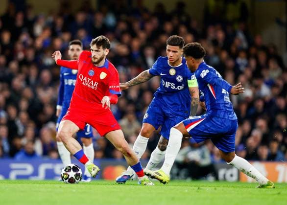 Khvicha Kvaratskhelia of Paris Saint Germain gets away from Enzo Fernandez and Andrey Santos of Chelsea Chelsea v Paris Saint Germain, Football, UEFA Champions League Round of 16 2nd Leg, Stanford Bridge, Chelsea, London - UK, 17 03 2026 Editorial use only  Copyright: xMattxImpey Shutterstockx 16778767ah