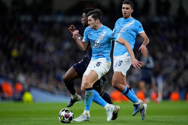 March 17, 2026, Manchester, Manchester, England: Aurelien Tchouameni of Real Madrid CF and Abdukodir Khusanov of Manchester City in action during the UEFA Champions League 2025 26 Round of 16 Second Leg match between Manchester City and Real Madrid C.F. at Etihad Stadium on March 17, 2026, in Manchester, England. Manchester City V Real Madrid C.F. - UEFA Champions League 2025 26 Round Of 16 Second Leg  - ZUMAa181 20260317_zaa_a181_205 Copyright: xDennisxAgyemanx