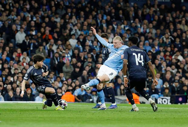 Manchester, England, 17th March 2026. Erling Haaland of Manchester City has a shot blocked during the Manchester City vs Real Madrid UEFA Champions League round of 16 match at the Etihad Stadium, Manchester. Picture credit should read: Cody Froggatt Sportimage EDITORIAL USE ONLY. No use with unauthorised audio, video, data, fixture lists, club league logos or live services. Online in-match use limited to 120 images, no video emulation. No use in betting, games or single club league player publications. SPI_046_CF_ManCity_Madrid SPI-4612-0091