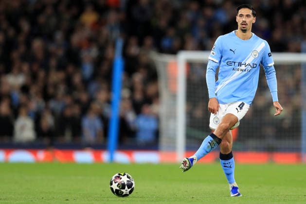 17th March 2026; Etihad Stadium, Manchester, England; UEFA Champions League Football, Manchester City versus Real Madrid; Tijjani Reijnders of Manchester City passes the ball  DavidxBlunsden Content restricted for UK based newspaper