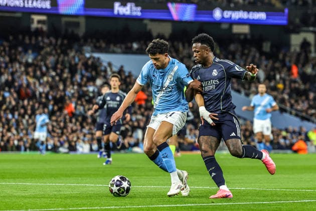 Manchester City FC v Real Madrid CF - UEFA Champions League 2025 26 Round of 16 Second Leg Matheus Nunes of Manchester City controls the ball under pressure from Vinicius Junior of Real Madrid during the UEFA Champions League last 16 second leg match between Manchester City and Real Madrid at The City of Manchester Stadium in Manchester, United Kingdom, on March 17, 2026. Manchester Greater Manchester United, ManU Kingdom  Copyright: xNewsxImagesx originalFilename:cosgrove-uefacham260317_npSp5.jpg