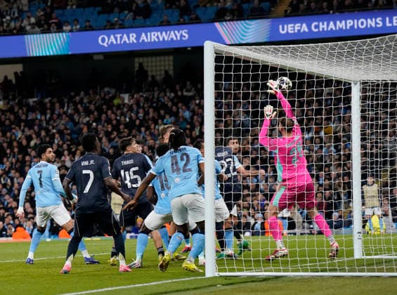 Manchester, England, 17th March 2026. Gianluigi Donnarumma of Manchester City makes a save during the Manchester City vs Real Madrid UEFA Champions League round of 16 match at the Etihad Stadium, Manchester. Picture credit should read: Andrew Yates Sportimage EDITORIAL USE ONLY. No use with unauthorised audio, video, data, fixture lists, club league logos or live services. Online in-match use limited to 120 images, no video emulation. No use in betting, games or single club league player publications. SPI_055_AY_ManCity_Madrid SPI-4612-0101