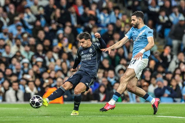 Manchester City FC v Real Madrid CF - UEFA Champions League 2025 26 Round of 16 Second Leg Brahim Diaz of Real Madrid shoots on goal under pressure from Rayan Ait-Nouri of Manchester City during the UEFA Champions League last 16 second leg match between Manchester City and Real Madrid at The City of Manchester Stadium in Manchester, United Kingdom, on March 17, 2026. Manchester Greater Manchester United, ManU Kingdom  Copyright: xNewsxImagesx originalFilename:cosgrove-uefacham260317_npWGa.jpg