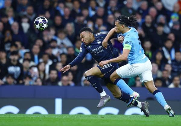 Kylian Mbappe of Real Madrid and Nathan Ake of Manchester City Manchester City v Real Madrid, UEFA Champions League, Round of 16, Second Leg, Football, Etihad Stadium, Manchester, UK - 17 Mar 2026Manchester Etihad Stadium United Kingdom EDITORIAL USE ONLY No use with unauthorised audio, video, data, fixture lists, club league logos or live services. Online in-match use limited to 120 images, no video emulation. No use in betting, games or single club league player publications.  Copyright: xMattxWest Shutterstockx 16776379ba