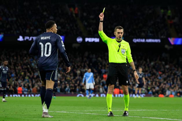 Manchester City v Real Madrid, Champions League Kylian Mbappe (10) of Real Madrid is given a yellow card by referee Clement Turpin during the Champions League match between Manchester City and Real Madrid at the Etihad Stadium, Manchester, UK on 17 March 2026. Manchester Etihad Stadium Manchester UK Editorial use only , Copyright: xConorxMolloyx PSI-23911-0052