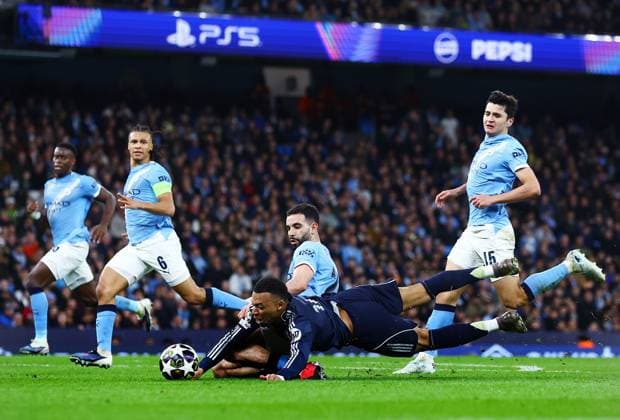 Kylian Mbappe of Real Madrid and Rayan Ait-Nouri of Manchester City Manchester City v Real Madrid, UEFA Champions League, Round of 16, Second Leg, Football, Etihad Stadium, Manchester, UK - 17 Mar 2026Manchester Etihad Stadium United Kingdom EDITORIAL USE ONLY No use with unauthorised audio, video, data, fixture lists, club league logos or live services. Online in-match use limited to 120 images, no video emulation. No use in betting, games or single club league player publications.  Copyright: xMattxWest Shutterstockx 16776379bc