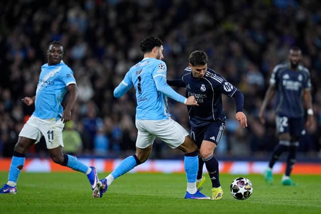 March 17, 2026, Manchester, Manchester, England: Brahim Diaz of Real Madrid CF and Omar Marmoush of Manchester City in action during the UEFA Champions League 2025 26 Round of 16 Second Leg match between Manchester City and Real Madrid C.F. at Etihad Stadium on March 17, 2026, in Manchester, England. Manchester England - ZUMAa181 20260317_zaa_a181_221 Copyright: xDennisxAgyemanx