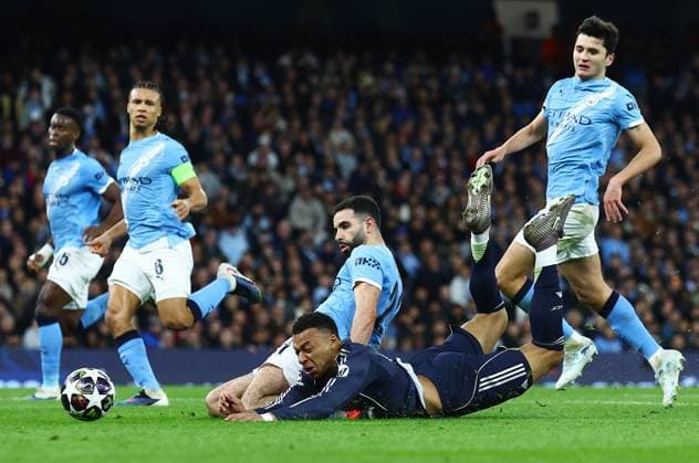Kylian Mbappe of Real Madrid and Rayan Ait-Nouri of Manchester City Manchester City v Real Madrid, UEFA Champions League, Round of 16, Second Leg, Football, Etihad Stadium, Manchester, UK - 17 Mar 2026Manchester Etihad Stadium United Kingdom EDITORIAL USE ONLY No use with unauthorised audio, video, data, fixture lists, club league logos or live services. Online in-match use limited to 120 images, no video emulation. No use in betting, games or single club league player publications.  Copyright: xMattxWest Shutterstockx 16776379bd