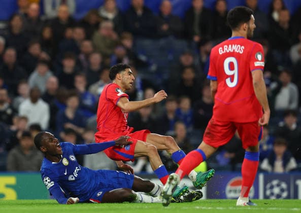 London, England, 17th March 2026. Trevoh Chalobah of Chelsea is injured following a challenge from Achraf Hakimi of Paris Saint-Germain during the Chelsea vs Paris Saint Germain UEFA Champions League round of 16 match at Stamford Bridge, London. Picture credit should read: Paul Terry Sportimage EDITORIAL USE ONLY. No use with unauthorised audio, video, data, fixture lists, club league logos or live services. Online in-match use limited to 120 images, no video emulation. No use in betting, games or single club league player publications. SPI_063_PT_Chelsea_PSG SPI-4610-0062