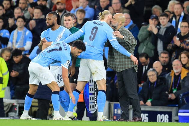 17th March 2026; Etihad Stadium, Manchester, England; UEFA Champions League Football, Manchester City versus Real Madrid; Manchester City manager Pep Guardiola hugs Erling Haaland as he is substituted during the second half  DavidxBlunsden Content restricted for UK based newspaper