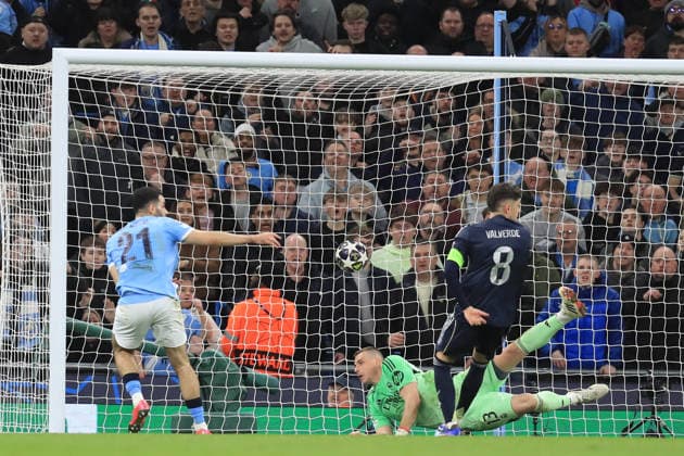 17th March 2026; Etihad Stadium, Manchester, England; UEFA Champions League Football, Manchester City versus Real Madrid; Rayan Ait-Nouri of Manchester City beats Andriy Lunin of Real Madrid but sees his effort disallowed  DavidxBlunsden Content restricted for UK based newspaper