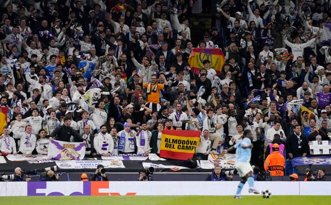 Manchester, England, 17th March 2026. Real Madrid fans during the Manchester City vs Real Madrid UEFA Champions League round of 16 match at the Etihad Stadium, Manchester. Picture credit should read: Andrew Yates Sportimage EDITORIAL USE ONLY. No use with unauthorised audio, video, data, fixture lists, club league logos or live services. Online in-match use limited to 120 images, no video emulation. No use in betting, games or single club league player publications. SPI_063_AY_ManCity_Madrid SPI-4612-0114