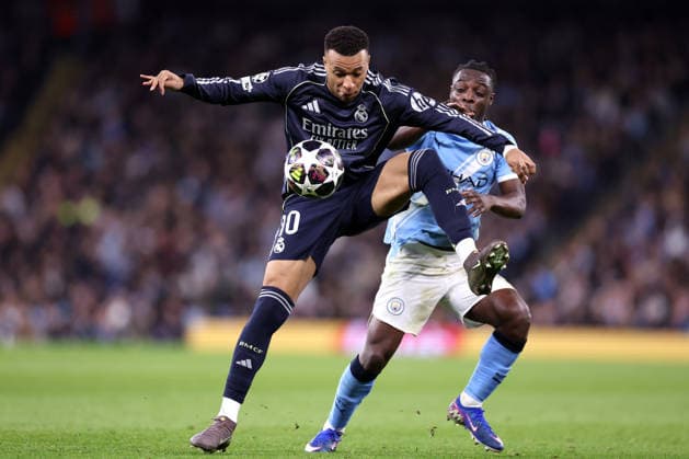 Manchester City v Real Madrid - UEFA Champions League MANCHESTER, UNITED KINGDOM - MARCH 17: Kylian Mbappe of Real Madrid is challenged by Jeremy Doku of Manchester City during the UEFA Champions League Round of 16 Second Leg match between Manchester City and Real Madrid CF at City of Manchester Stadium on March 17, 2026 in Manchester, United Kingdom. Alex Livesey Anadolu Manchester United, ManU Kingdom. Editorial use only. Please get in touch for any other usage.  Copyright: x2026xAnadoluxAlexxLiveseyx