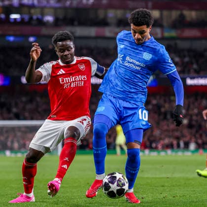 LONDON, ENGLAND - MARCH 17: Malik Tillman of Bayer 04 Leverkusen and Bukayo Saka of Arsenal battle for the ball during the UEFA Champions League 2025 26 Round of 16 Second Leg match between Arsenal FC and Bayer 04 Leverkusen at Arsenal Stadium on March 17, 2026 in London, England.  Copyright: xRenexNijhuis MBxMediax