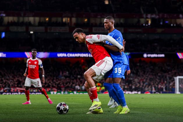 LONDON, ENGLAND - MARCH 17: Gabriel of Arsenal and Christian Kofane of Bayer 04 Leverkusen battle for the ball during the UEFA Champions League 2025 26 Round of 16 Second Leg match between Arsenal FC and Bayer 04 Leverkusen at Arsenal Stadium on March 17, 2026 in London, England.  Copyright: xRenexNijhuis MBxMediax