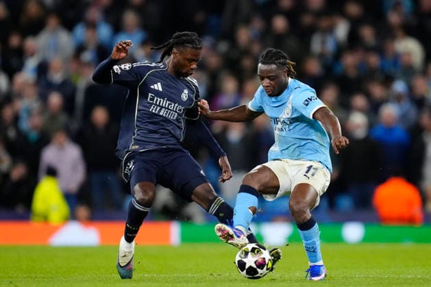 Manchester City FC v Real Madrid CF - UEFA Champions League 2025 26 Round of 16 Second Leg Aurelien Tchouameni defensive midfield of Real Madrid and France and Jeremy Doku left winger of Manchester City and Belgium compete for the ball during the UEFA Champions League 2025 26 Round of 16 Second Leg match between Manchester City FC and Real Madrid CF at City of Manchester Stadium on March 17, 2026 in Manchester, United Kingdom. Manchester England United Kingdom  Copyright: xJosexBretonx originalFilename:bretonhernandez-manchest260317_npmCD.jpg