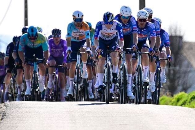 Danilith Nokere Koerse 2026 Cycling Race NOKERE, BELGIUM - MARCH 18 : rider of team Red Bull BORA - hansgrohe leading the peloton during the 79th edition of Danilith Nokere Koerse an UCI ProSeries 1.Pro one day cycling road race for Men Elite of km with start in Deinze and finish in Nokere on March 18, 2026 in Nokere, Belgium, 18 03 2026 ( Motordriver Danilith Nokere Koerse Cycling Race - Nokere Belgium  Copyright: xJanxDexMeuleneirx