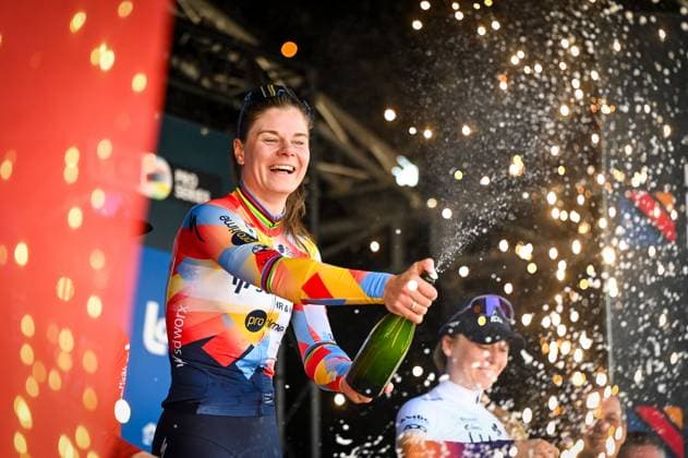 Belgian Lotte Kopecky of SD Worx-Protime celebrates on the podium with champagne after winning the Nokere Koerse one day cycling race for women elite, 133,3km from Deinze to Nokere, Kruisem on Wednesday 18 March 2026. ELIASxROM  x167992654x
