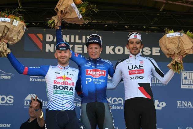 Belgian Jordi Meeus of Red Bull-BORA-hansgrohe, Belgian Jasper Philipsen of Alpecin-Premier Tech and Colombian Juan Sebastian Molano of UAE Team Emirates-XRG pictured on the podium after the Nokere Koerse one day cycling race for men elite, 186,4 km from Deinze to Nokere, Kruisem on Wednesday 18 March 2026. DAVIDxPINTENS  x168019272x