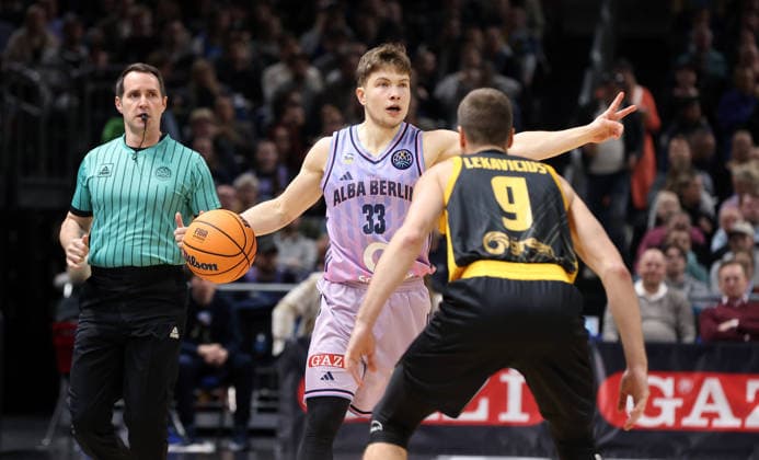 Bennet Hundt on the ball, Lukas Lekavicius duel Game scene Action Sport Basketball Champions League CL Men Season 2025 2026 18 03 2026 ALBA Berlin vs AEK BC Athens