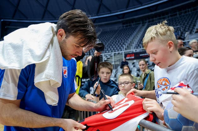 Croatia National Handball Team: training session Filip Glavas of Croatia signs an autograph to fans after training session at The Kresimir Cosic Hall in Zadar, Croatia on March 18, 2026. ahead of internationl friendly match between Croatia and Switzerland.  SimexZelic PIXSELL