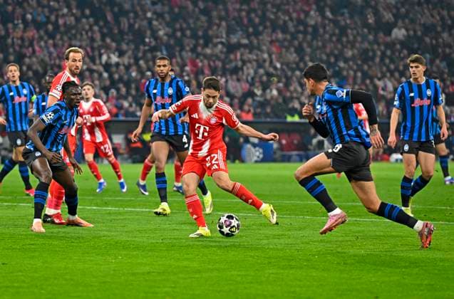 18 03 2026, Football UEFA Championsleague 2025 2026 Round of 16 second leg, FC Bayern Munich Atalanta Bergamo, at the Allianz Arena Munich, Raphael Guerreiro FC Bayern Munich prevails, DFL and DFB regulations prohibit any use of photographs as image sequences and or quasi video