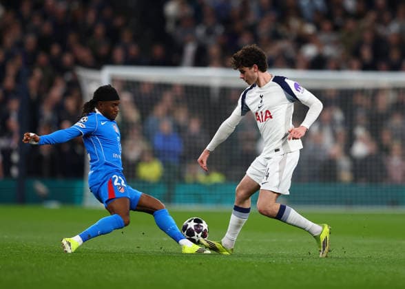 18th March 2026; Tottenham Hotspur Stadium, London, England; UEFA Champions League Football, Tottenham Hotspur versus Atletico Madrid; Archie Gray of Tottenham Hotspur under pressure from Ademola Lookman of Atletico Madrid  JPxFletcher Content restricted for UK based newspaper