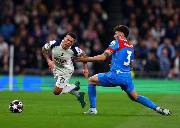 18th March 2026; Tottenham Hotspur Stadium, London, England; UEFA Champions League Football, Tottenham Hotspur versus Atletico Madrid; Matteo Ruggeri of Atletico Madrid tackles Pedro Porro of Tottenham Hotspur  JPxFletcher Content restricted for UK based newspaper