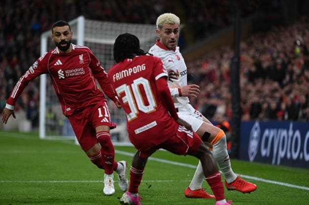 Liverpool v Galatasaray - UEFA Champions League LIVERPOOL, UNITED KINGDOM - MARCH 18: Frimpong (30) of Liverpool in action against Baris Alper Yilmaz (R) of Galatasaray during the UEFA Champions League Round of 16 rematch between Liverpool and Galatasaray at Anfield Stadium in Liverpool, United Kingdom, on March 18, 2026. Rasid Necati Aslim Anadolu Liverpool United Kingdom. Editorial use only. Please get in touch for any other usage.  Copyright: x2026xAnadoluxRasidxNecatixAslimx