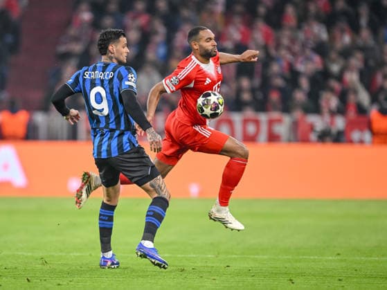 Gianluca Scamacca Atalanta BC and Jonathan Tah FC Bayern München battle for the ball during the UEFA Champions League 2025 26 Round of 16 Second Leg match between FC Bayern München and Atalanta BC at Football Arena Munich on March 18, 2026 in Munich, Germany Photo by Harry Langer DeFodi Images