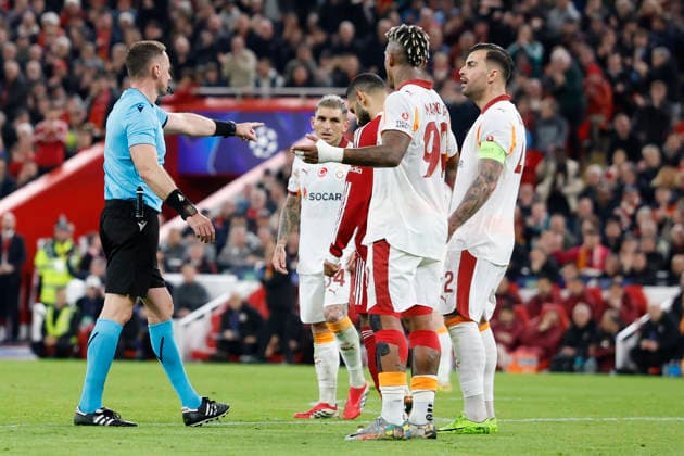 Liverpool, England, 18th March 2026. Referee Pawel Raczkowski awards Liverpool a penalty during the Liverpool vs Galatasaray UEFA Champions League round of 16 match at Anfield, Liverpool. Picture credit should read: Cody Froggatt Sportimage EDITORIAL USE ONLY. No use with unauthorised audio, video, data, fixture lists, club league logos or live services. Online in-match use limited to 120 images, no video emulation. No use in betting, games or single club league player publications. SPI_047_CF_Liverpool_Galatasaray SPI-4618-0047