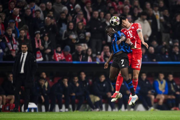 FC Bayern Munchen v Atalanta BC - UEFA Champions League Kamaldeen Sulemana of Atalanta BC competes for a header with Kim Min-Jae of FC Bayern Munchen during the UEFA Champions League 2025 26 knockout phase round of 16 second leg football match between FC Bayern Munchen and Atalanta BC. Munich Germany Copyright: xNicolòxCampox