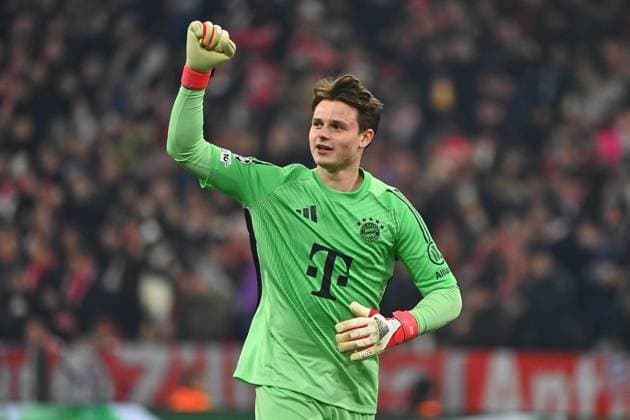 Goalkeeper Jonas URBIG Bayern Muenchen , cheering,joy,enthusiasm,action,single picture,cropped single motif,half figure,half figure Football Champions League,season 2025 26, round of 16 FC Bayern Muenchen Atalanta Bergamo on 18 03 2026 A L L I A N Z A R E N A